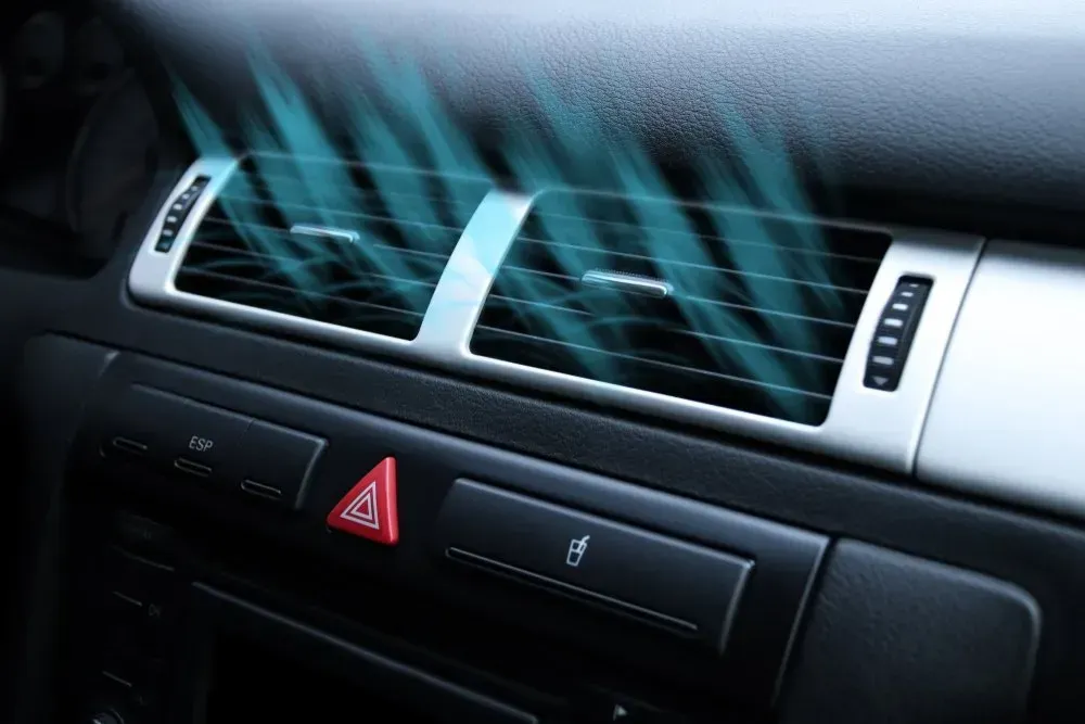 Car Dashboard With Air Vents Blowing Blue Air — Advanced Auto Electrics & Mechanical in Innisfail, QLD