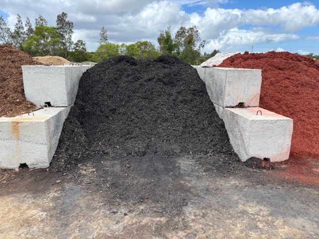 Black Coloured Mulch — Envy Landscape Supplies In Urangan, QLD