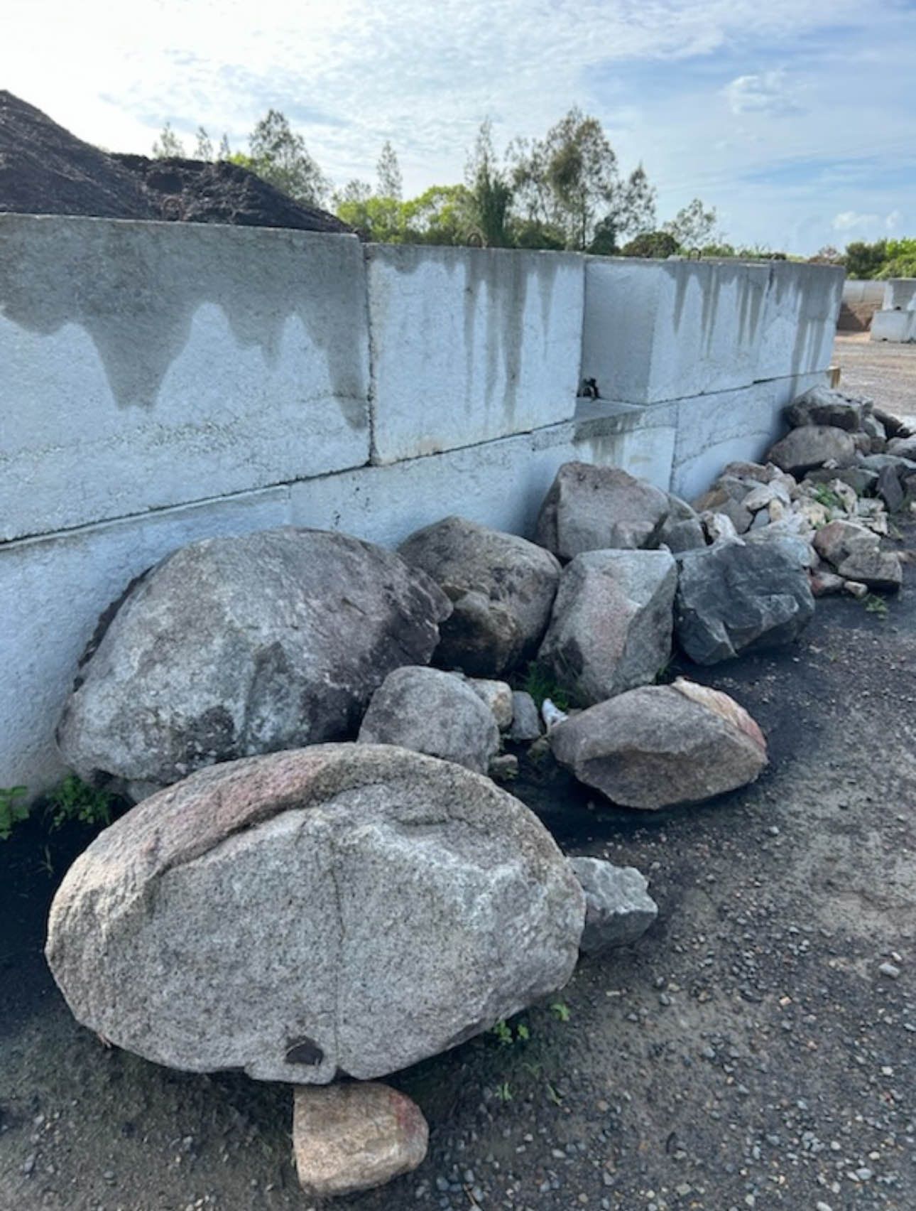 A Different Size Decorative Rocks  Against The Wall— Envy Landscape Supplies In Urangan, QLD