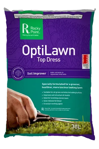 A bag of optilawn top dress sitting on top of other bags