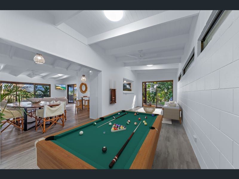 Pool Table in a Bright White Room With an Adjoining Dining Area — Red Emperor Constructions in Cannonvale, QLD