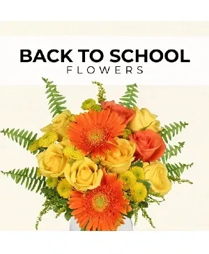 Back to School flowers: orange gerberas, yellow roses and mums, fern, white vase.