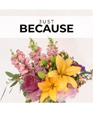 'Just Because' floral bouquet with pink, yellow, and purple flowers, on a white background.