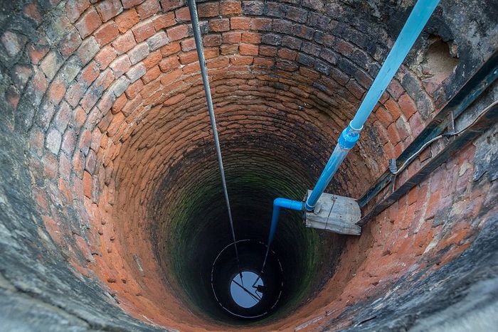 a deep well with pipe