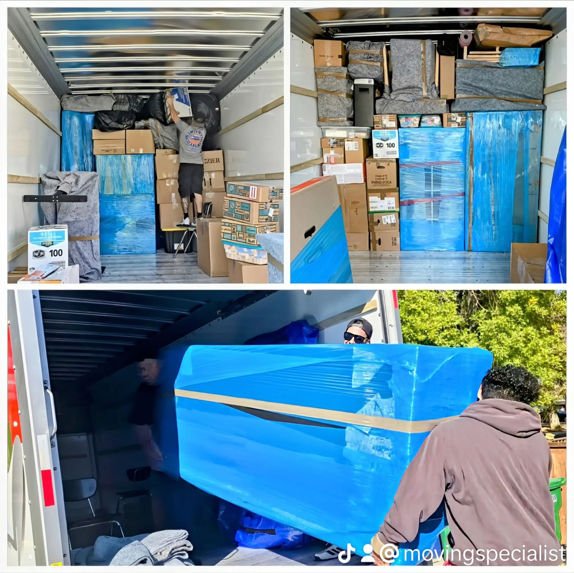 A man is carrying a large blue box in a moving truck.