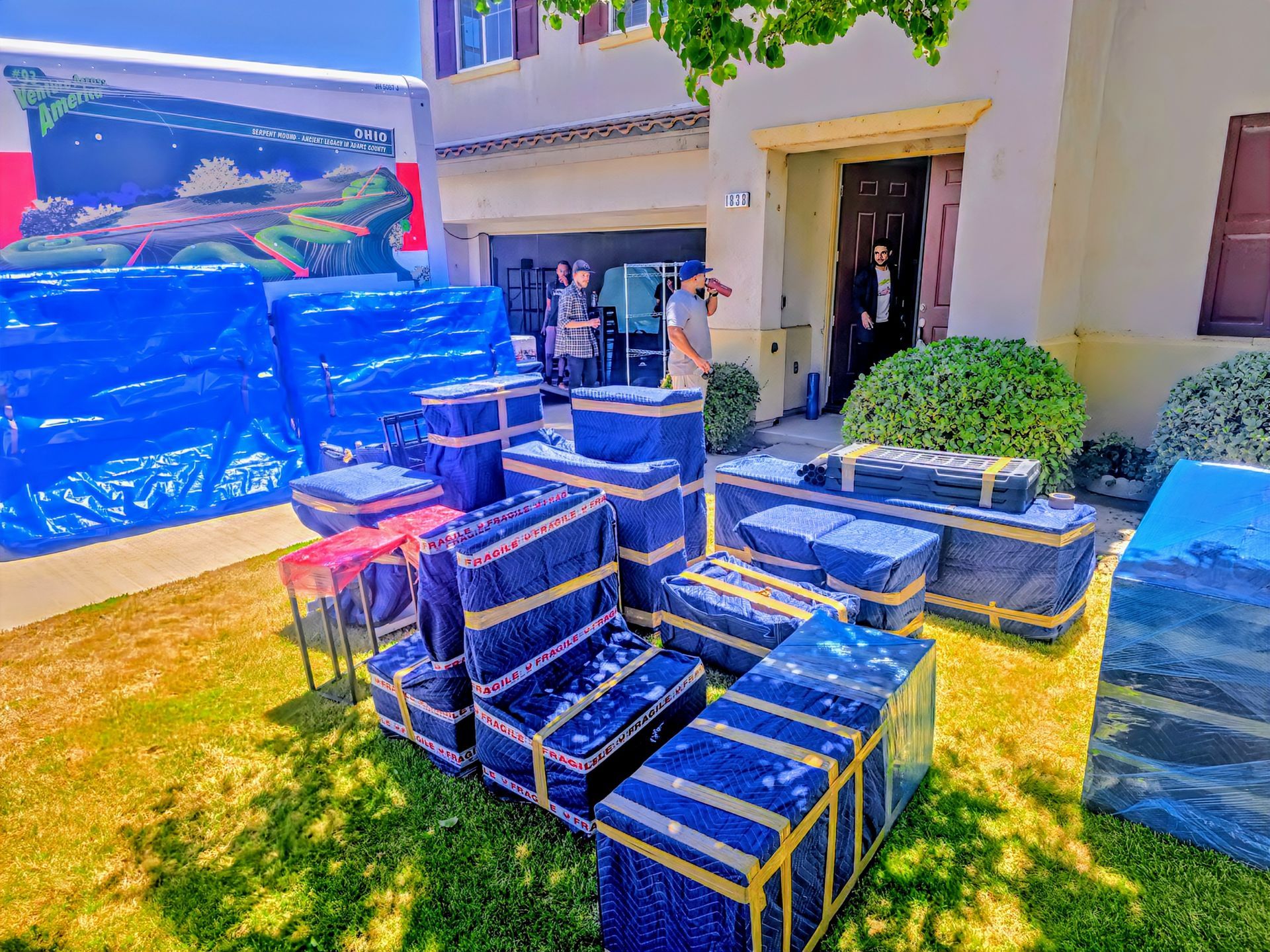 The inside of a moving truck filled with boxes and a sign that says cd 700