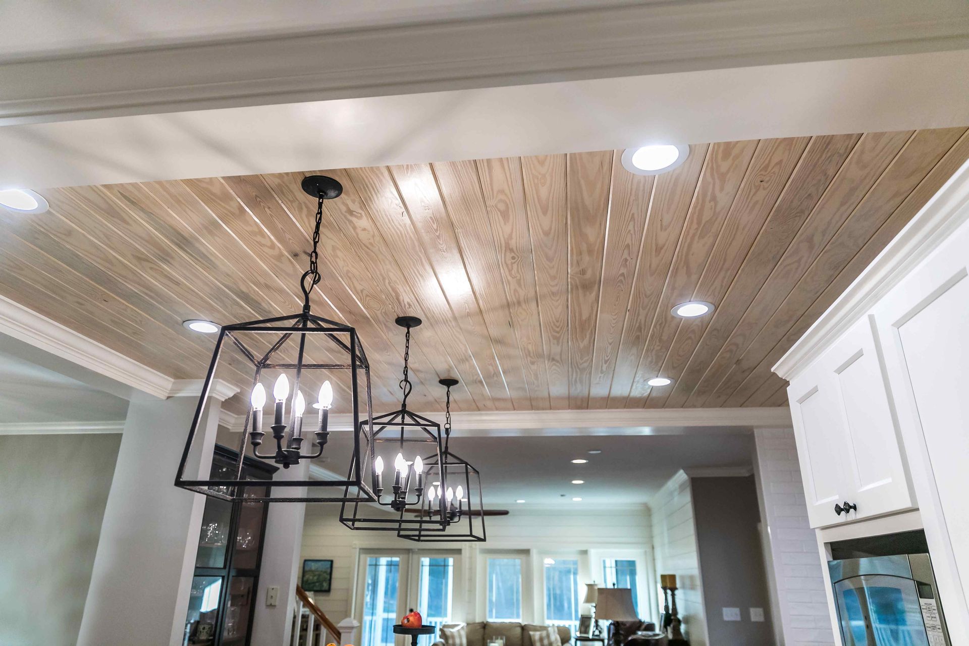 shot of a beautiful ceiling in a home with recessed lighting and light fixtures