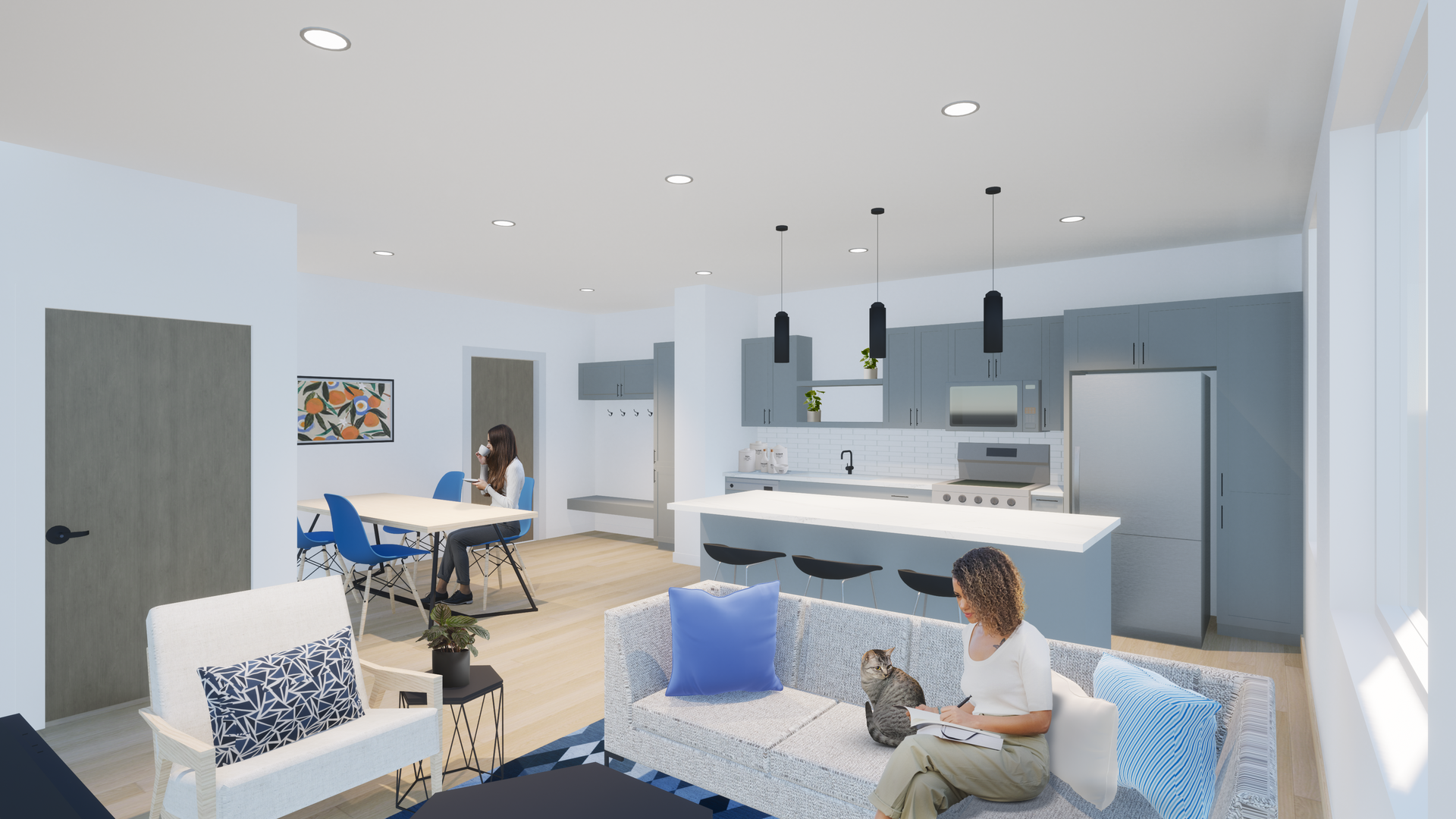 A woman is sitting on a couch in a living room next to a kitchen.
