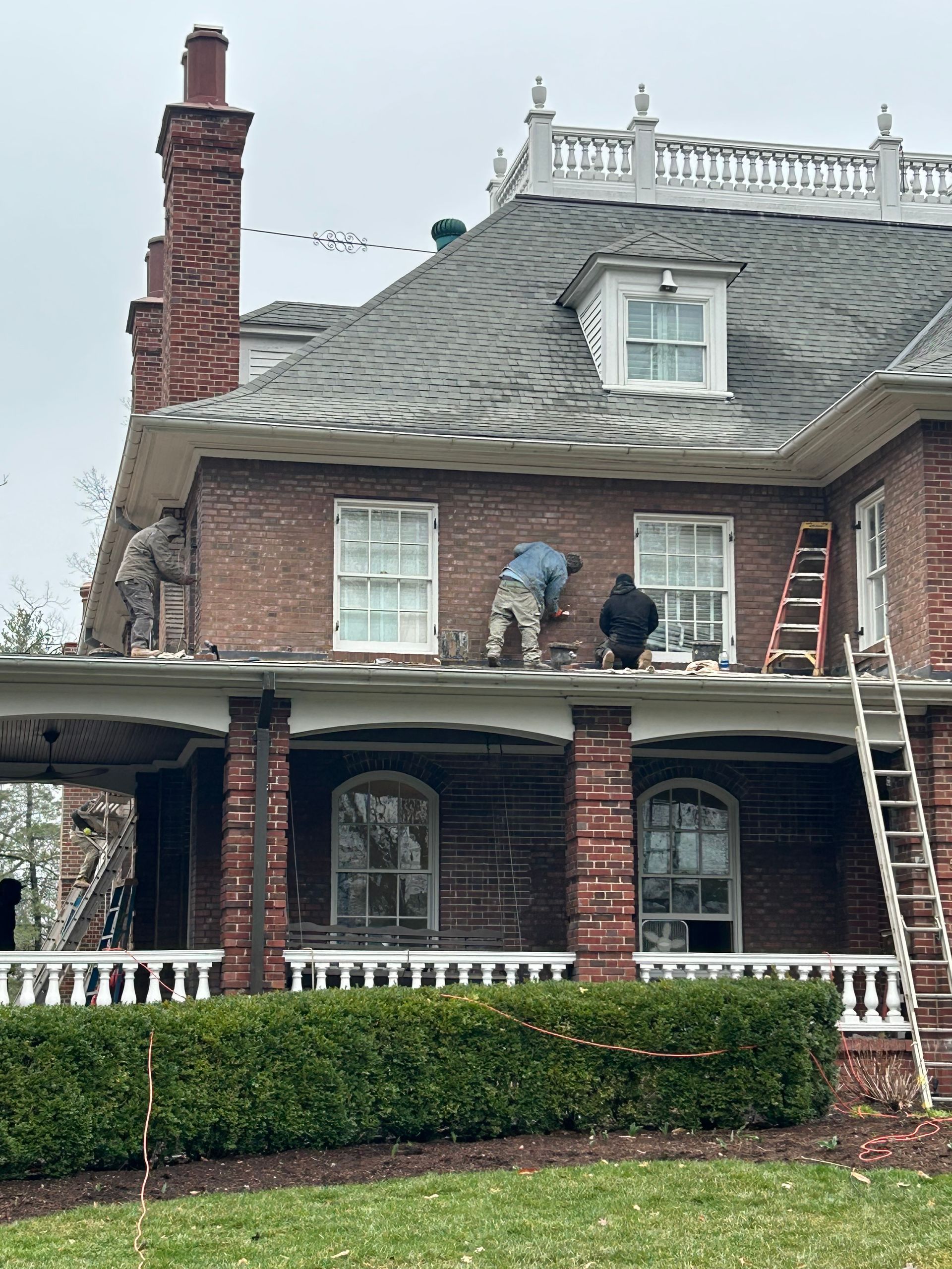 Tuckpointing and brick repair project on historical Kirkwood home.