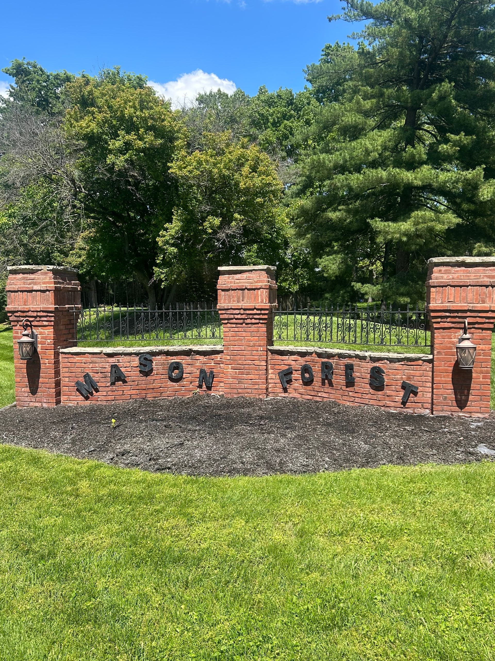 Professional masonry repair of a brick subdivision entryway monument sign St. Louis, MO.