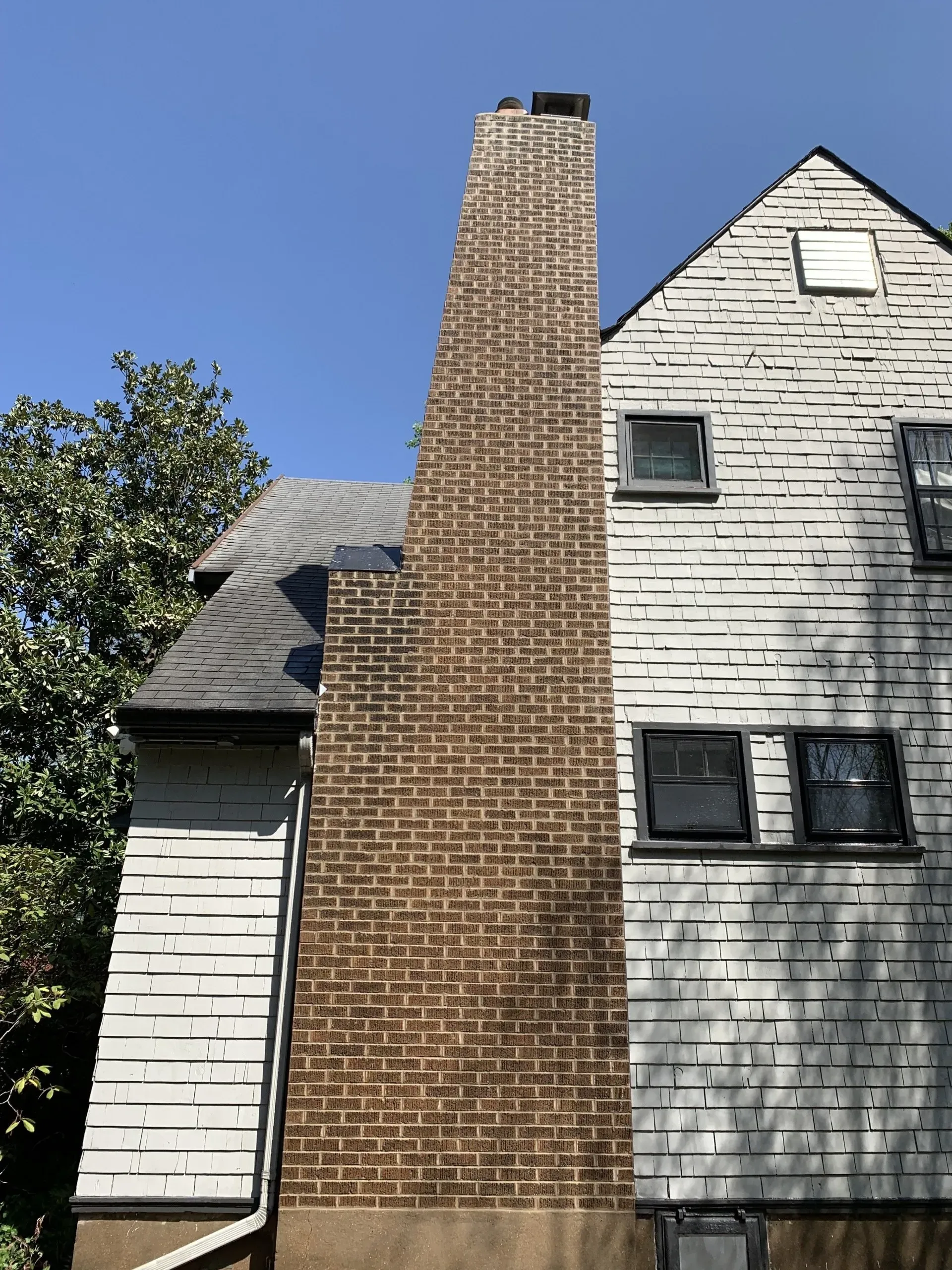 Tall Chimney Made By Bricks — St. Louis, MO — Mirelli Tuckpointing LLC