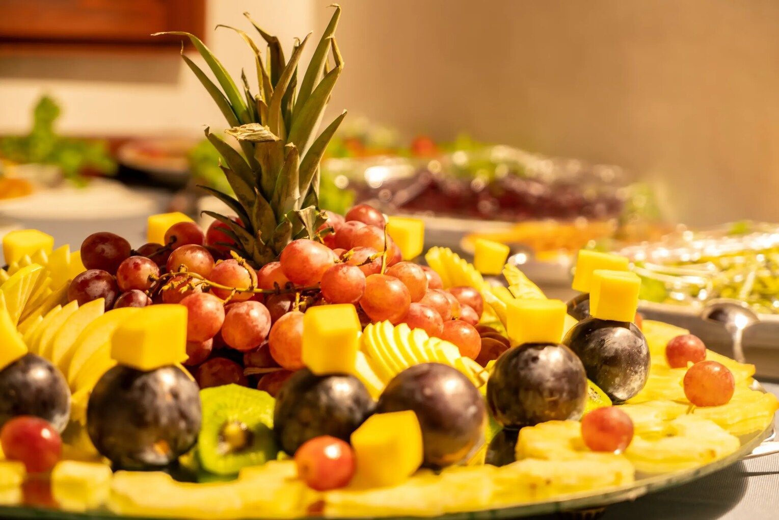 A close up of a plate of fruit on a table.