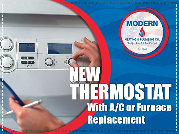 Advertisement for Modern Heating & Plumbing: hand adjusting thermostat with text 