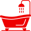 Red bathtub with shower head.