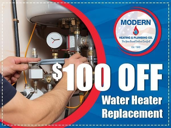 Plumber working on a water heater. 