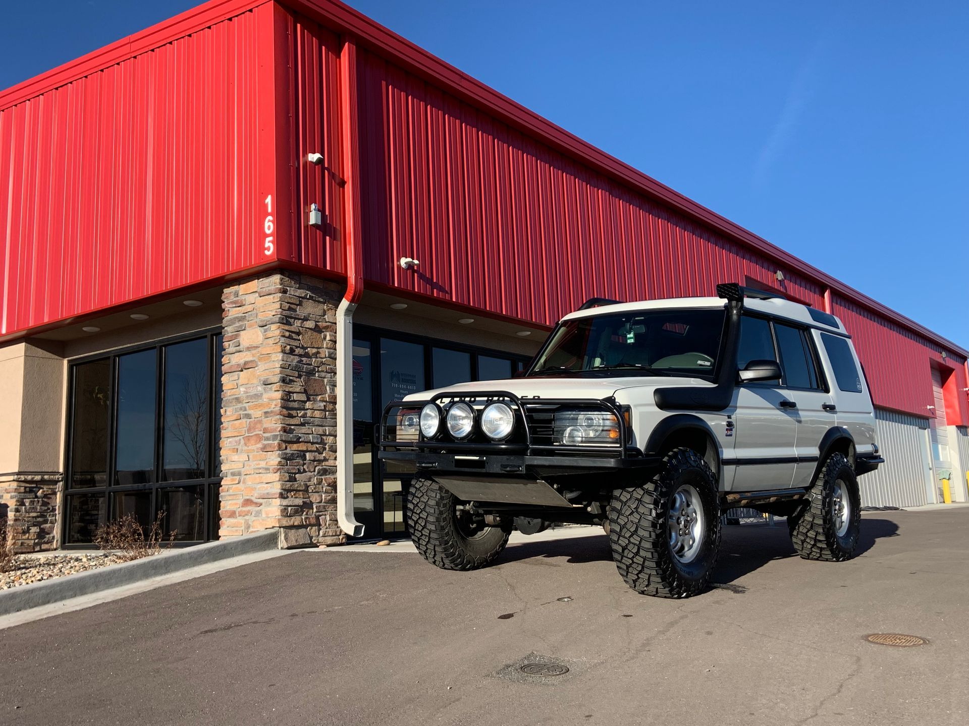 White Land Rover Discovery SUV | PPR Automotive