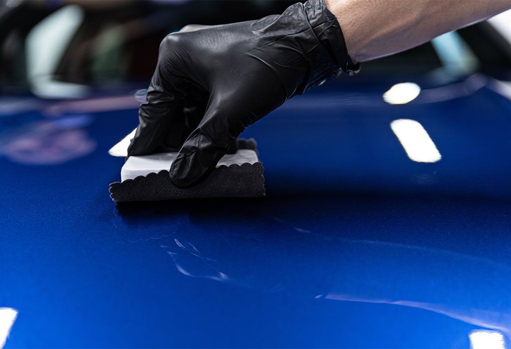 ceramic coating on a blue car