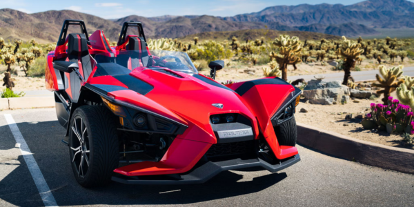 Three-wheeled autocycle with two front wheels and one rear wheel, referenced in H.R. 3385.