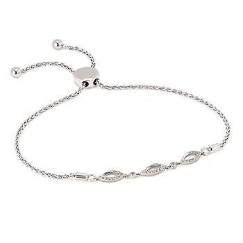 A person wearing a silver bracelet on their wrist