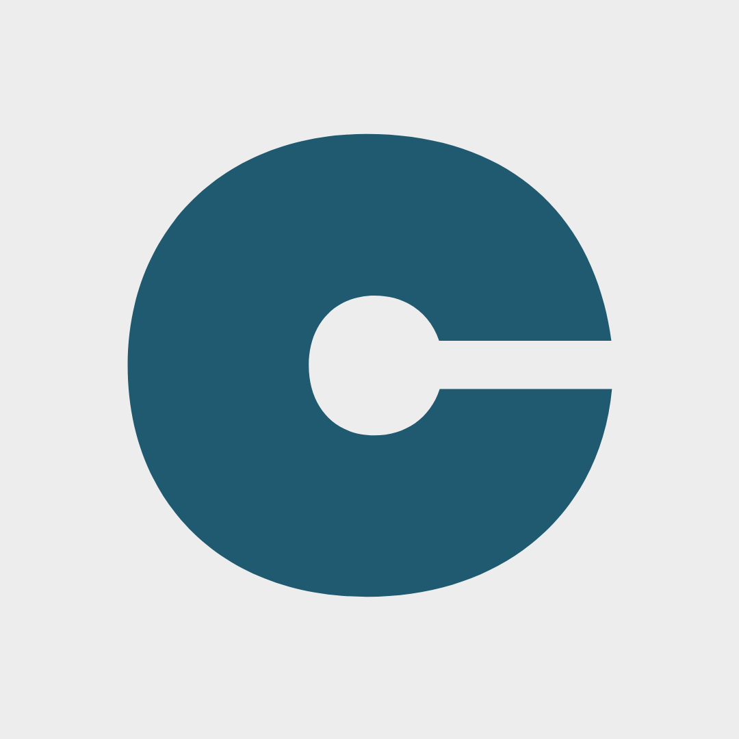 A blue circle with a white circle in the middle