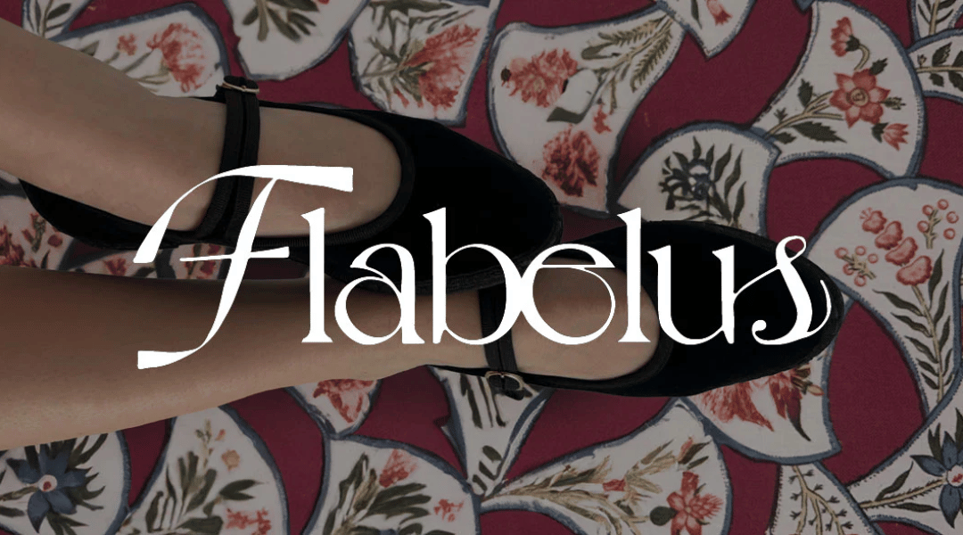 Black Mary Jane shoes on a floral patterned surface; 