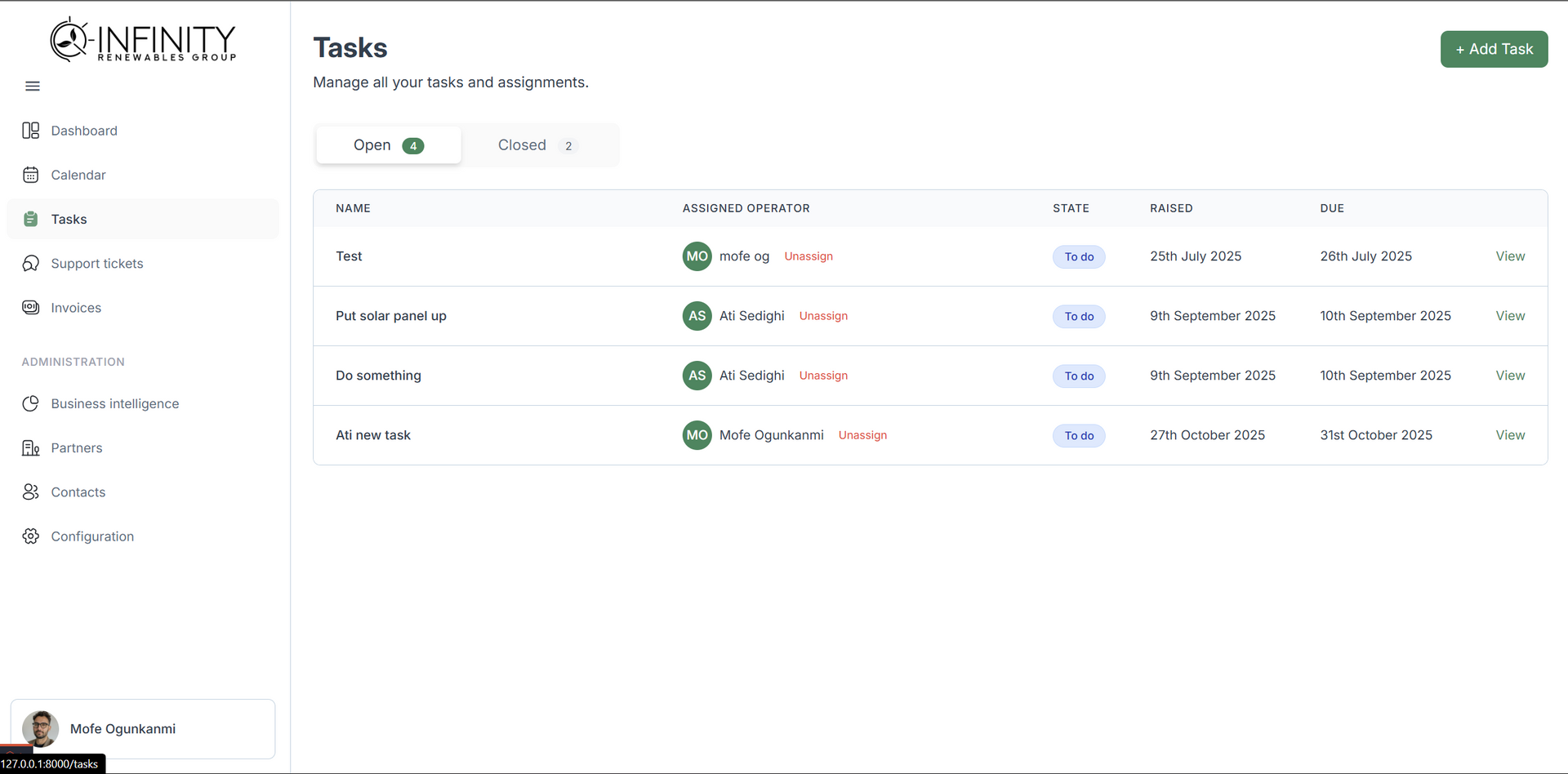 Web interface displaying task management information. Tasks list in a table format with related data and control buttons.
