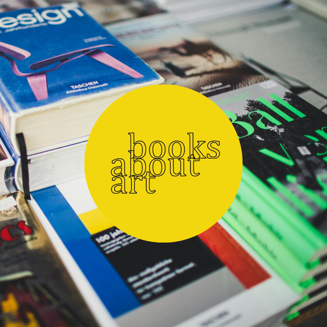 A stack of books with a yellow circle that says books about art