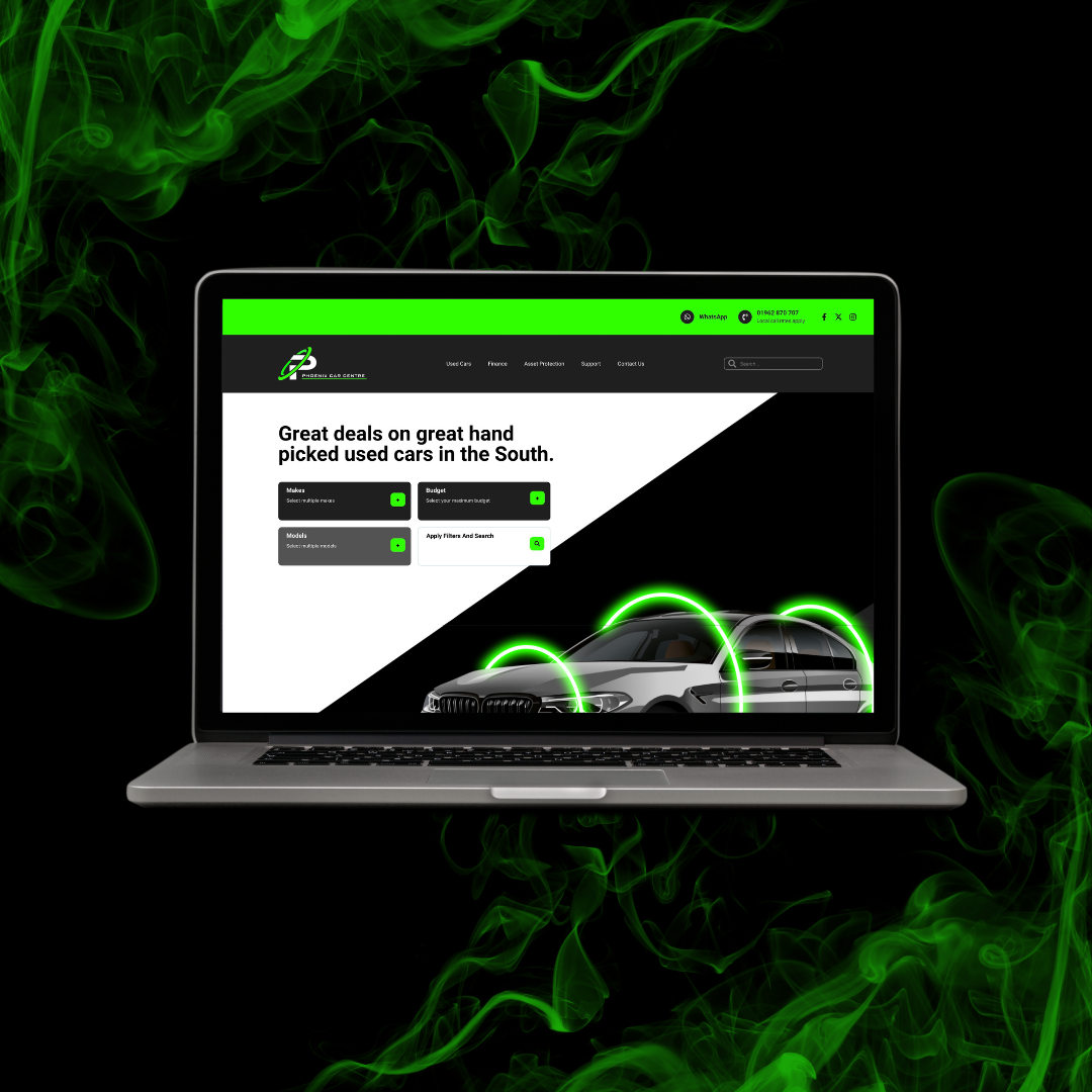 A laptop with a green background and a car on the screen