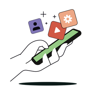 A hand is holding a square with a star on it in front of a computer screen.