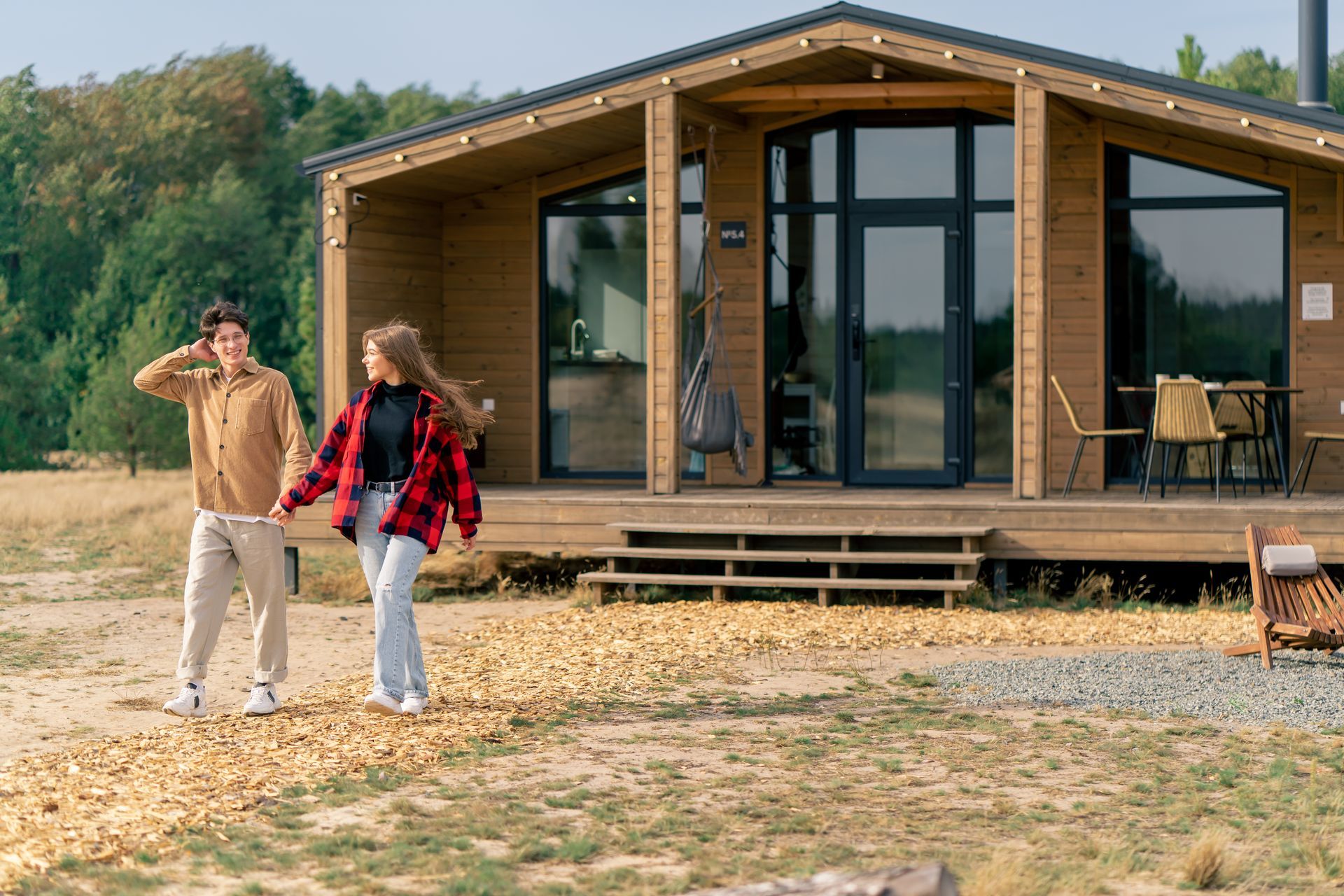 A family is sitting in a car looking out the window.