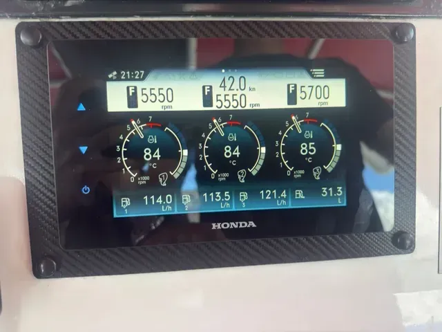 Boat Dashboard Displaying Engine Rpm, Speed, Temperature, and Fuel Consumption — HiTune Marine In Bentley Park, QLD 