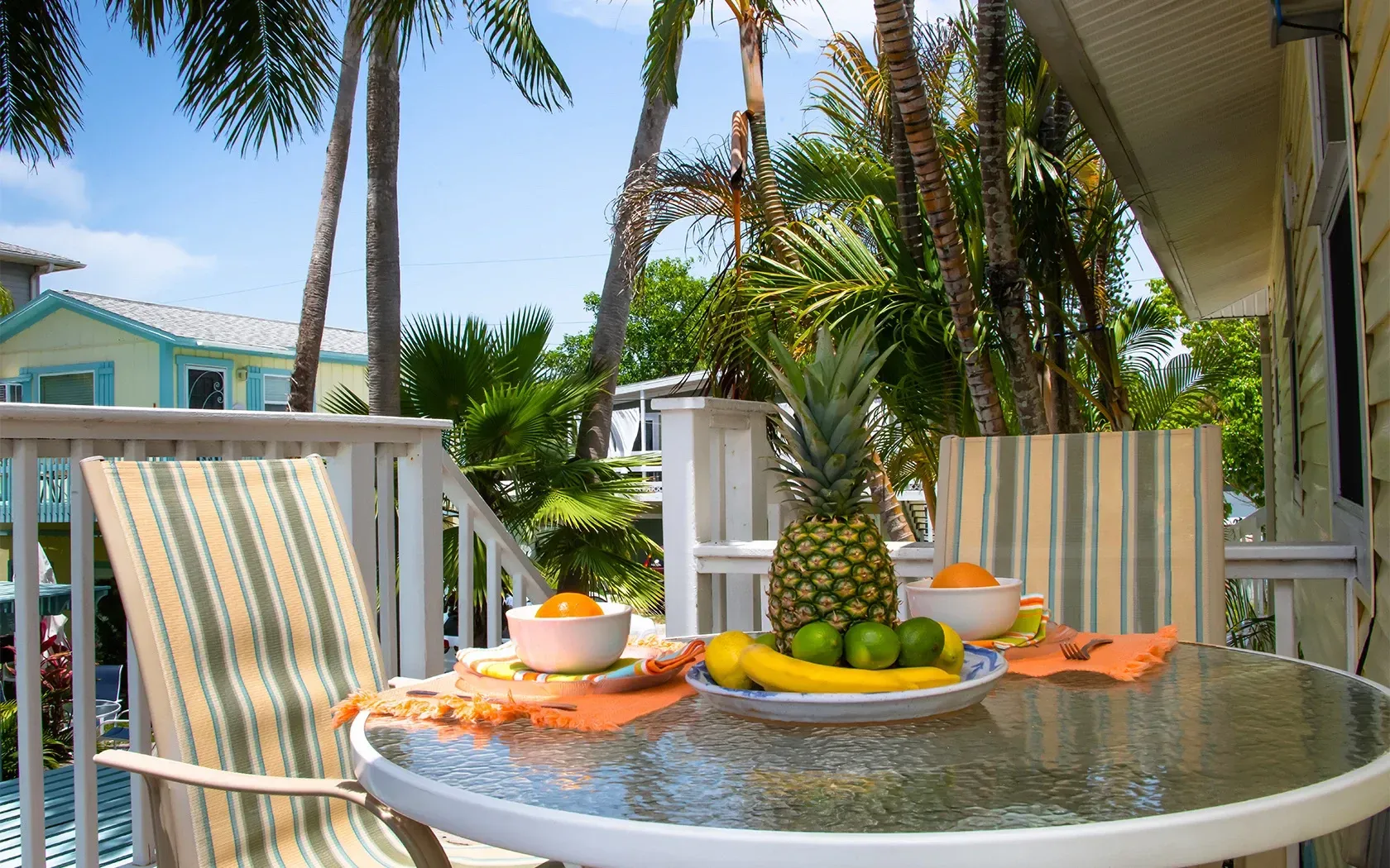 A table with a plate of fruit on it