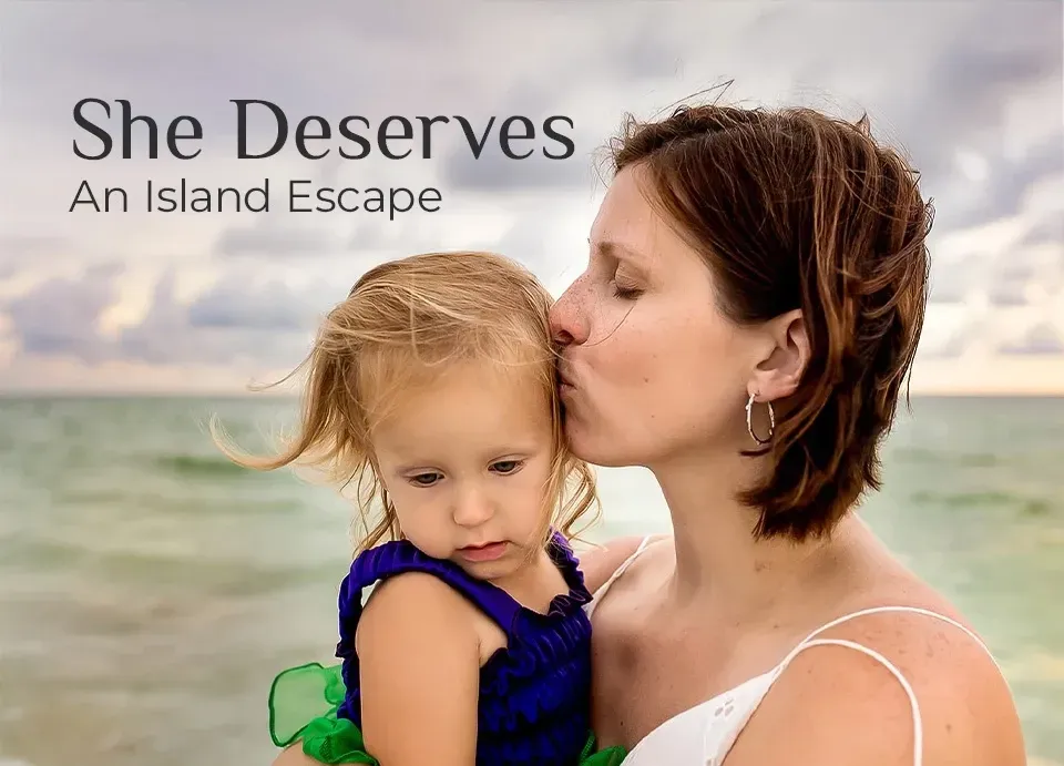 a woman kissing her daughter