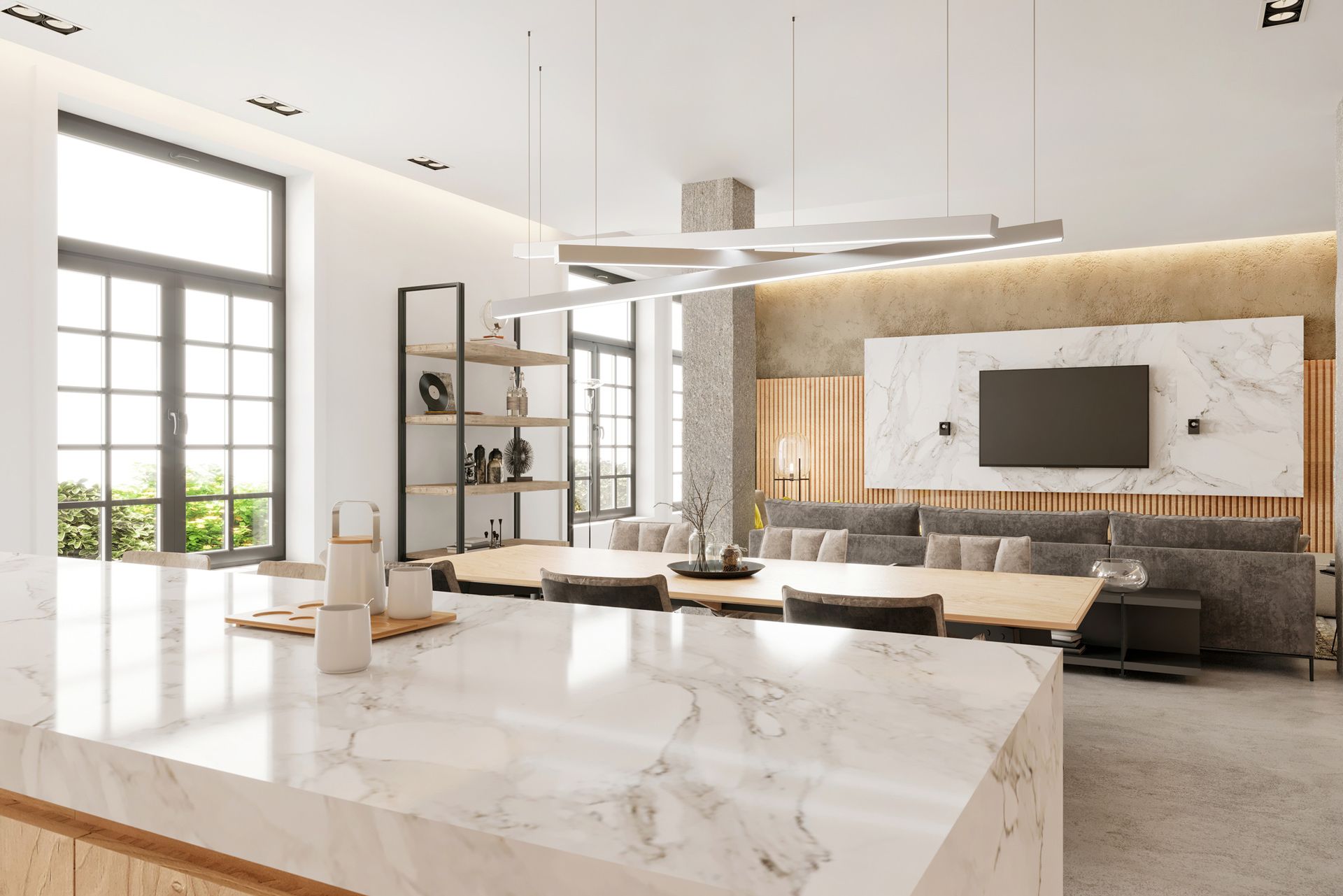 A living room with a marble counter top and a flat screen tv.