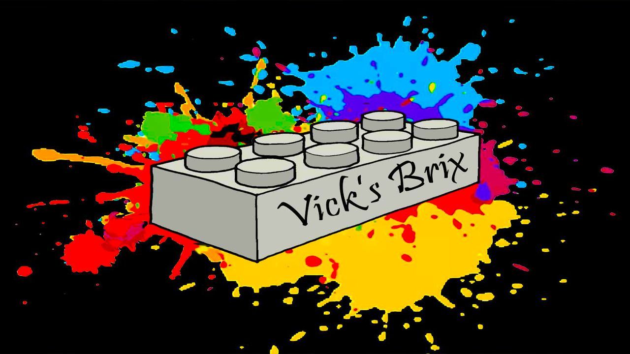 Colorful LEGO blocks scattered on a wooden table.