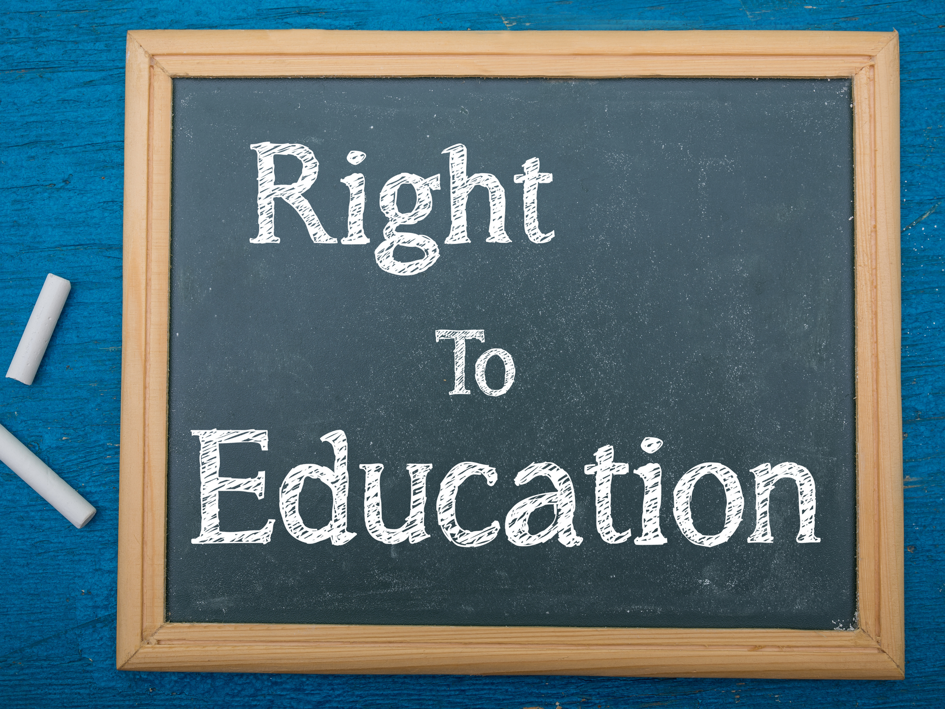 A blackboard with the words right to education written on it.