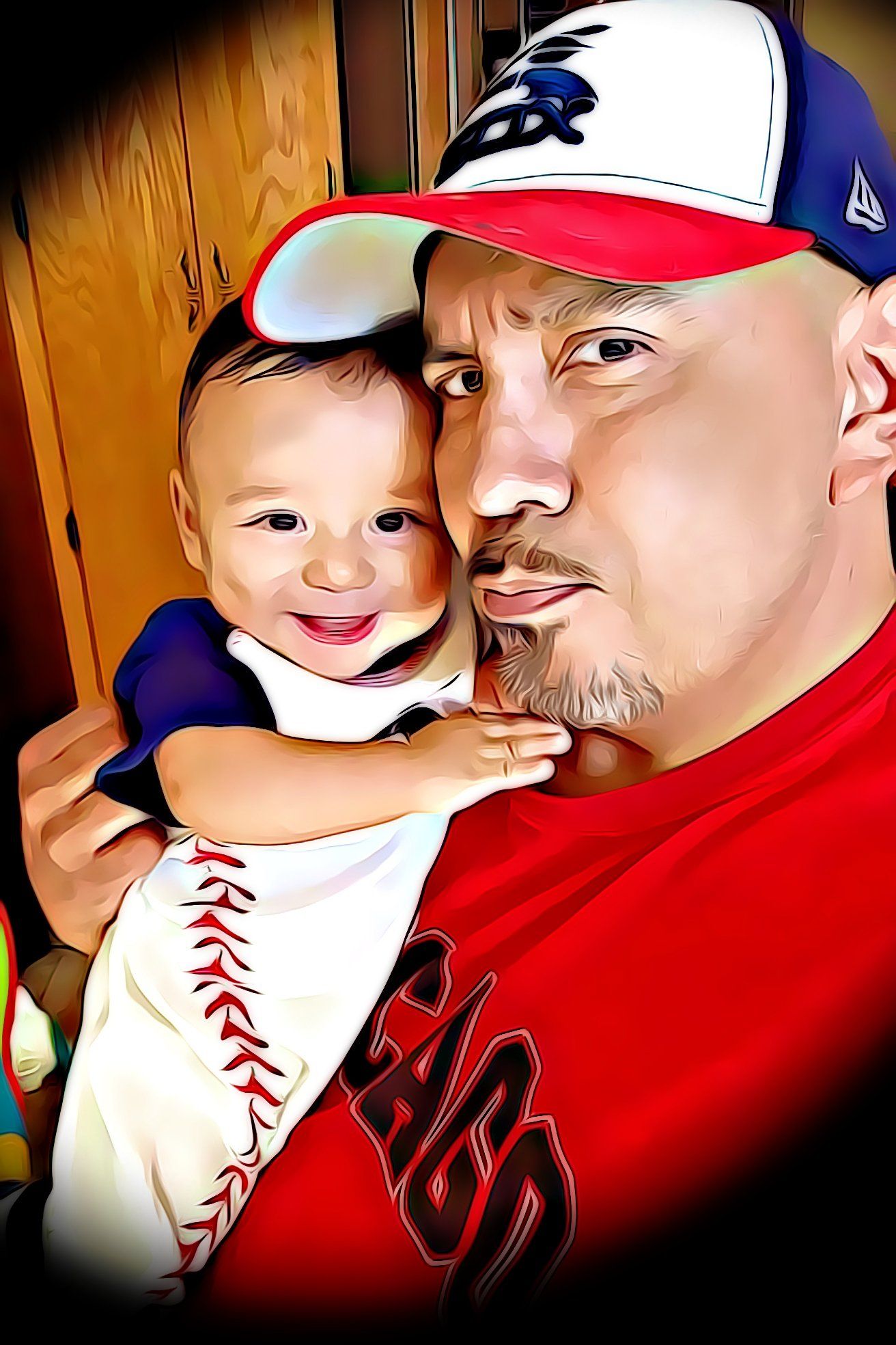 A man is holding a baby in his arms.