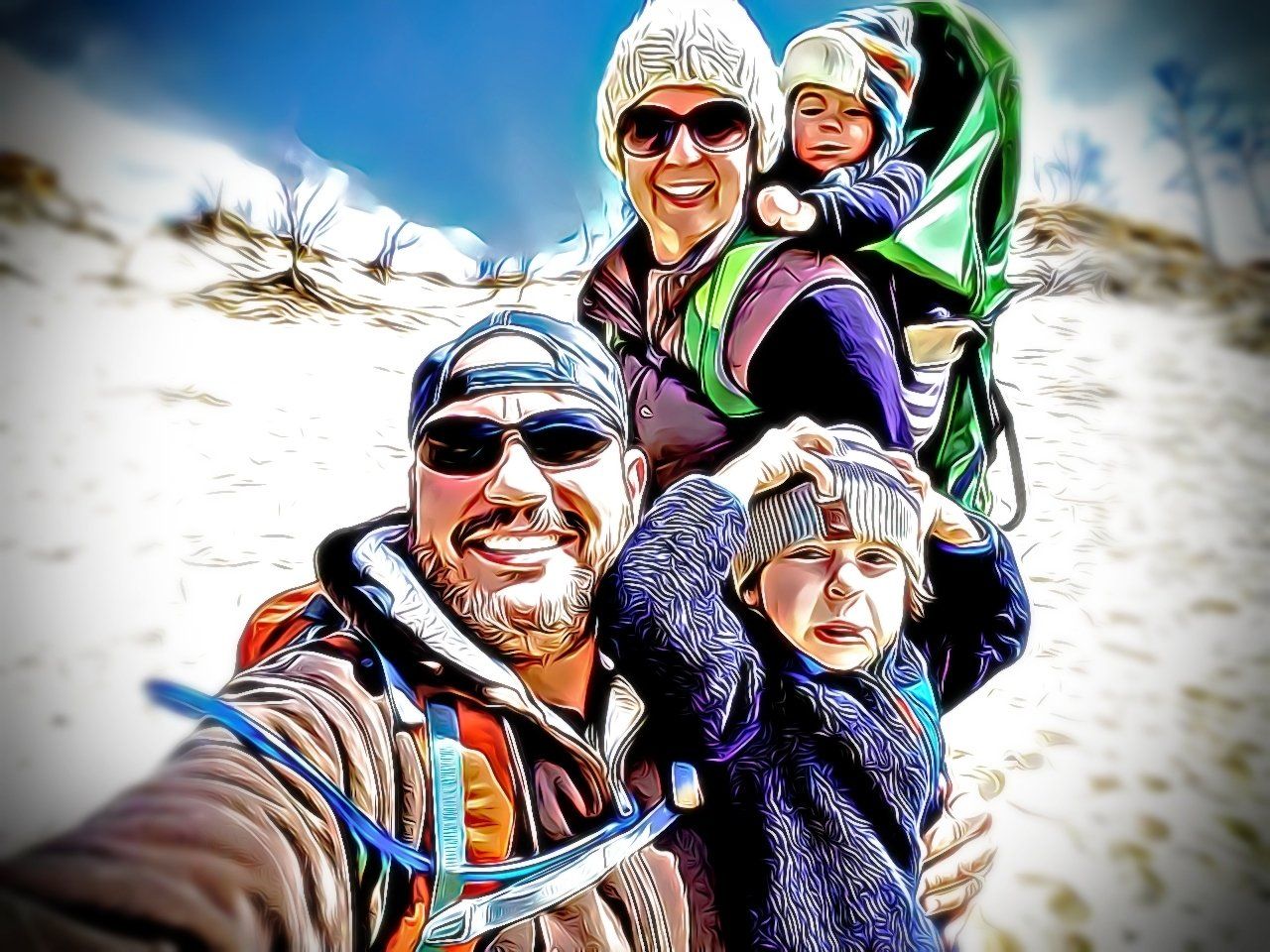 A group of people are posing for a picture in the snow.