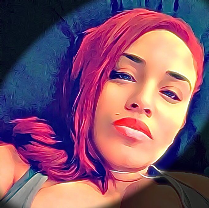 A painting of a woman with red hair and red lips