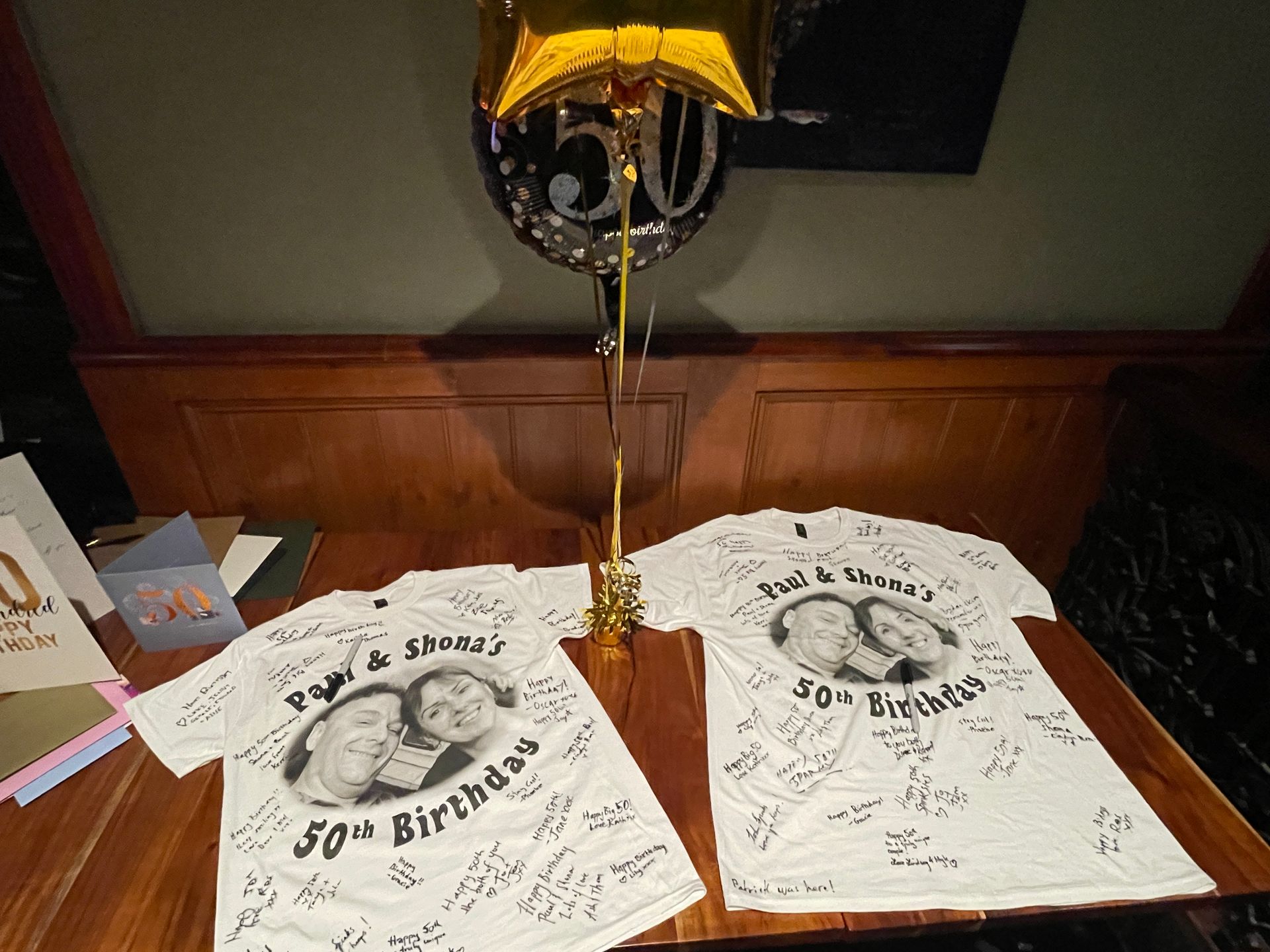 Two signed white T-shirts with a photo & 