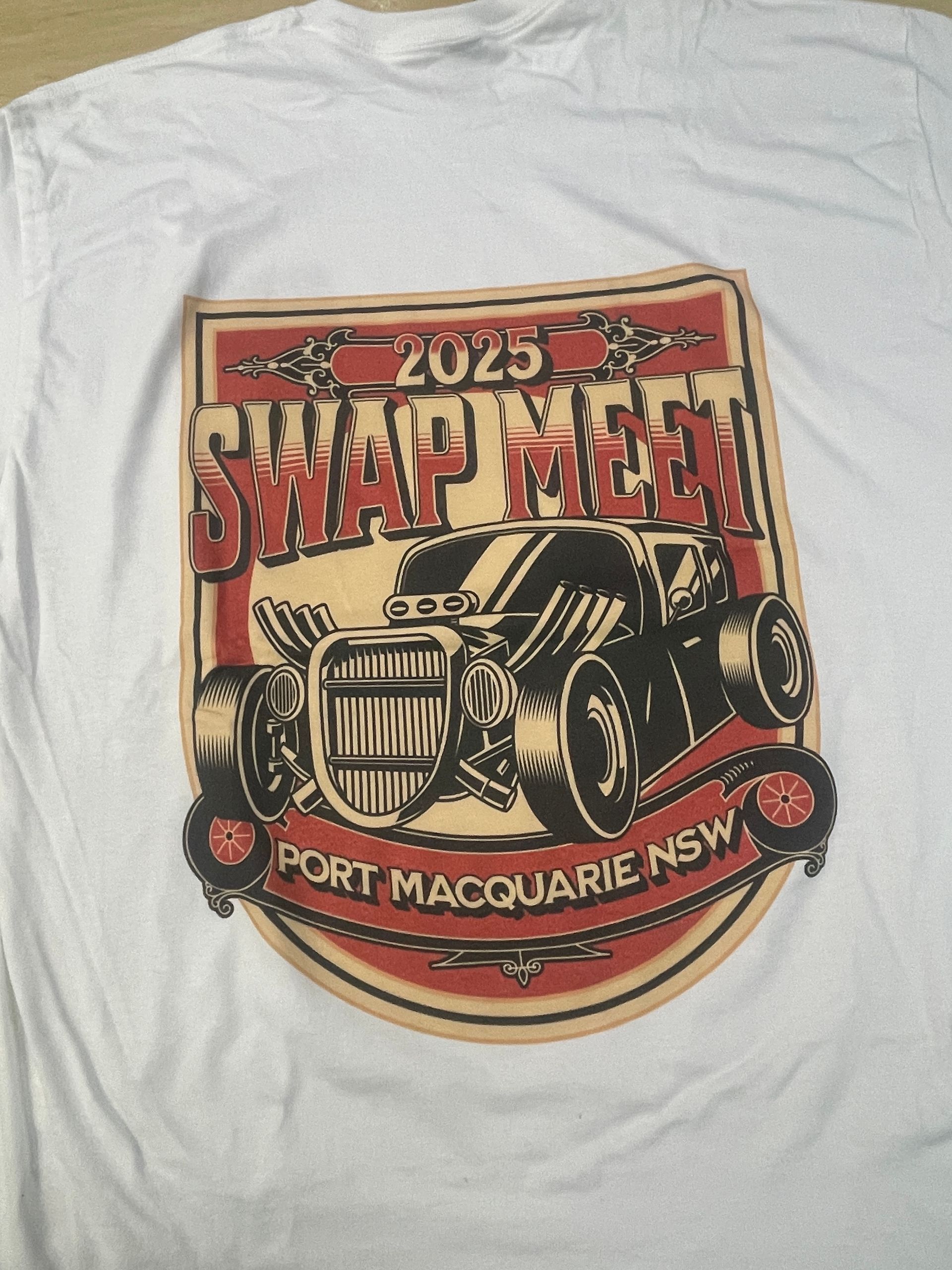White t-shirt with a brown and red graphic for a 2025 Swap Meet in Port Macquarie, NSW, featuring a hot rod car — Carbon Copy in Port Macquarie, NSW