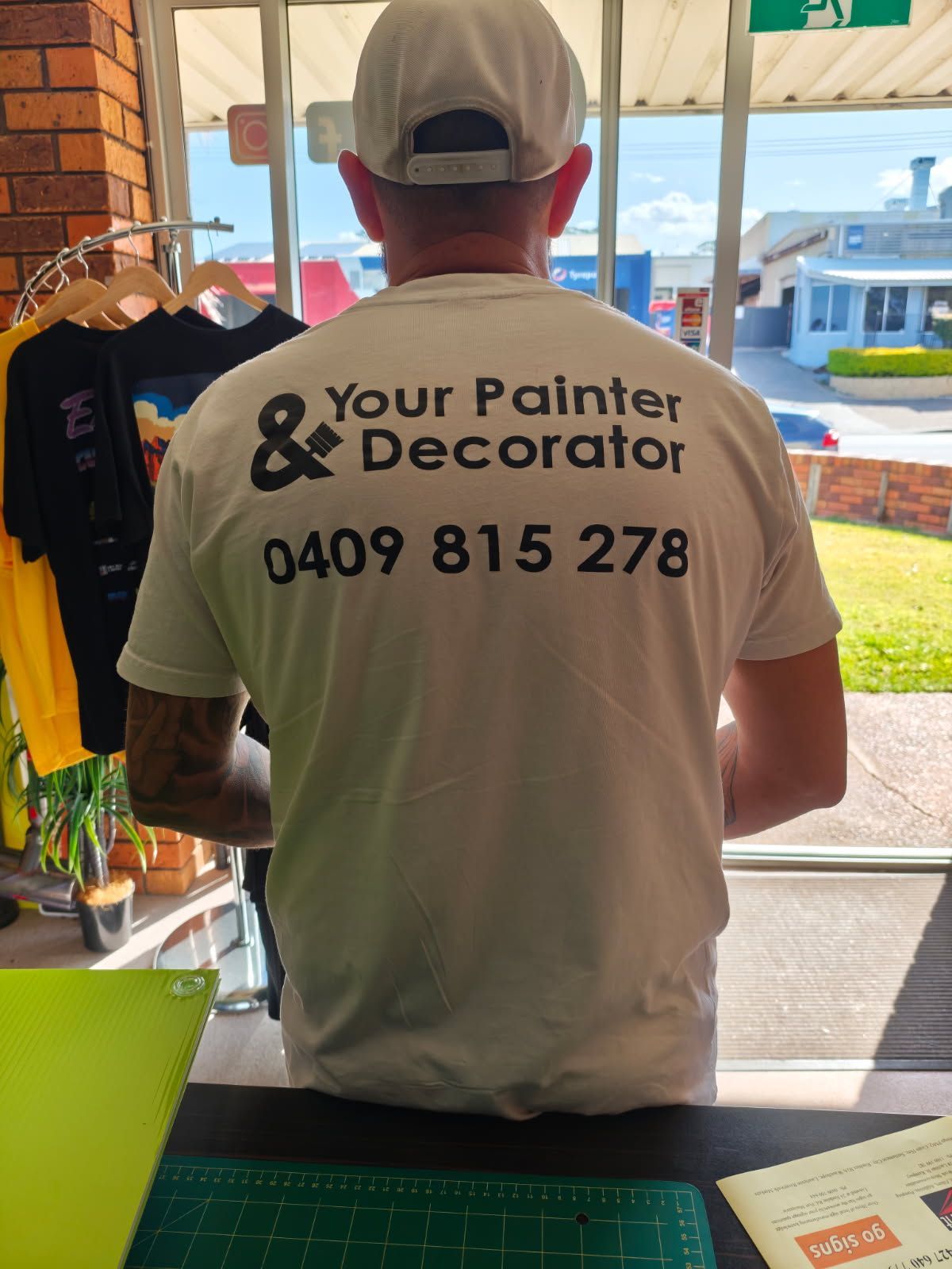 Man wearing a white shirt with 