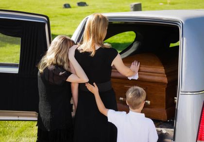 Grieving Family At A Funeral — Douglas, GA — Farrar, Hennesy & Tanner LLC