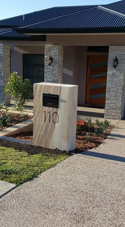 House With a Mailbox in Front of It — Red Dog Landscaping in Gold Coast, NSW