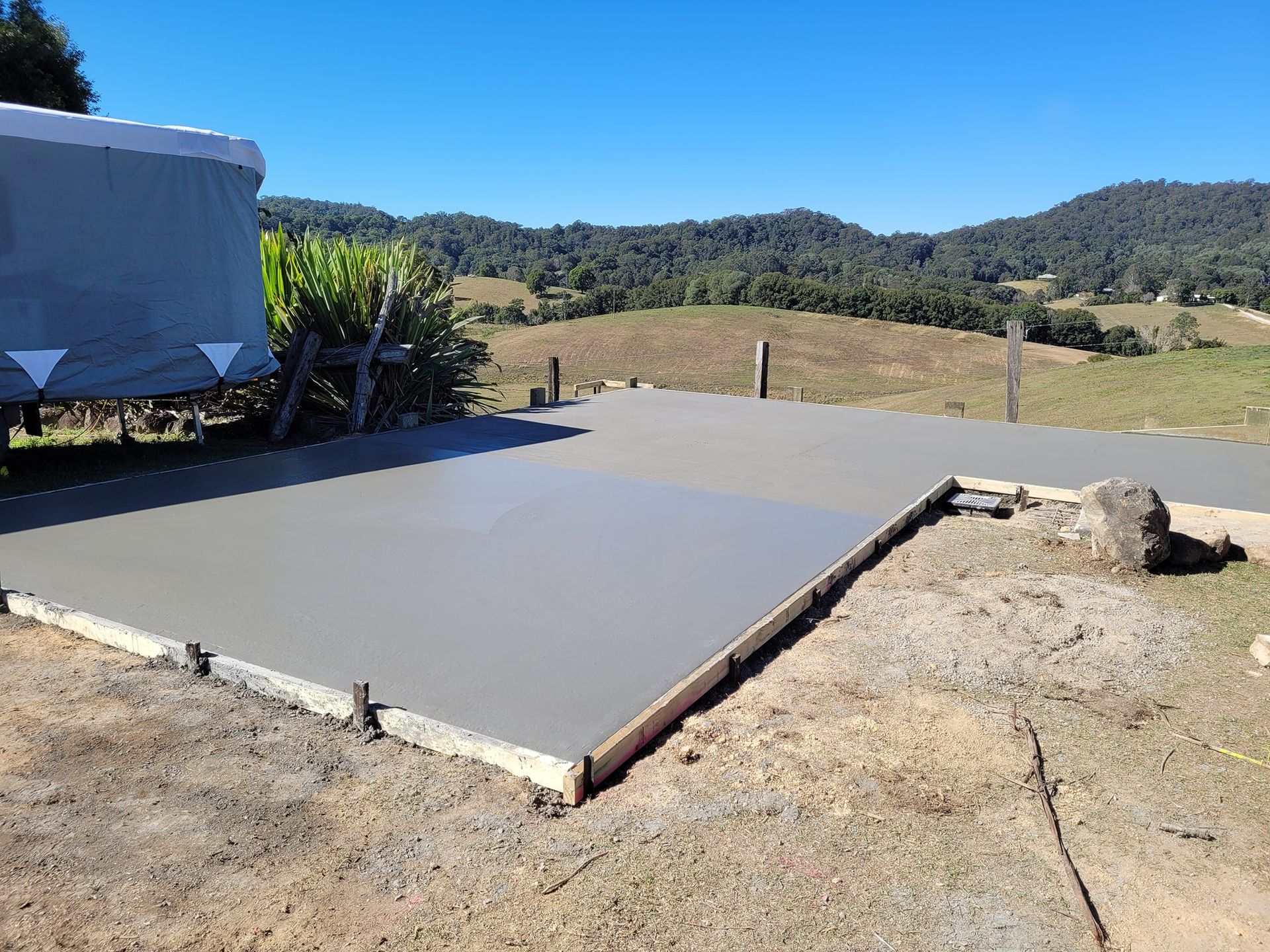 Paving In Backyard To Make Driveway — Red Dog Landscaping in Banora Point, NSW