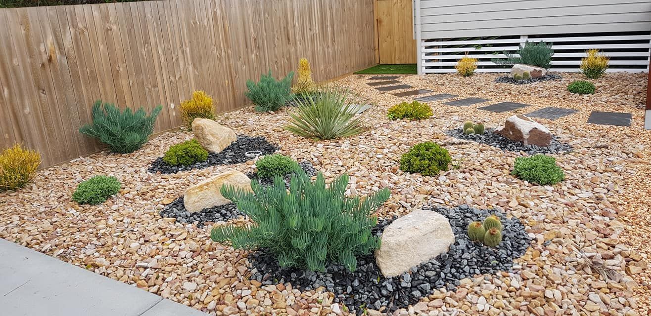 Landscaped Garden With Pebbles and Bushes — Red Dog Landscaping in Banora Point, NSW
