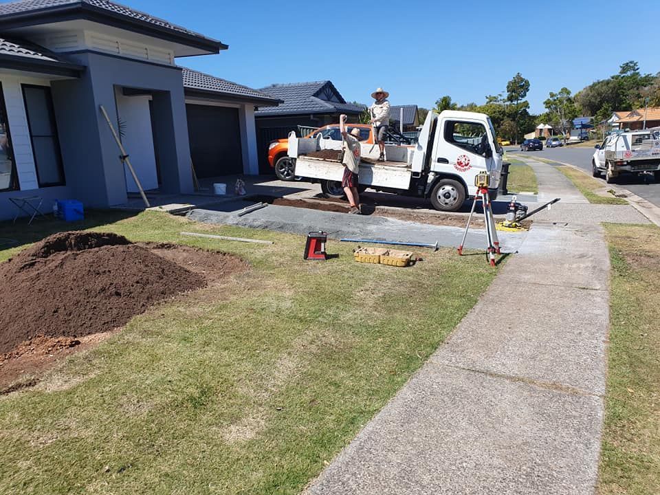 White Truck is Parked in Front of a House — Red Dog Landscaping in Banora Point, NSW