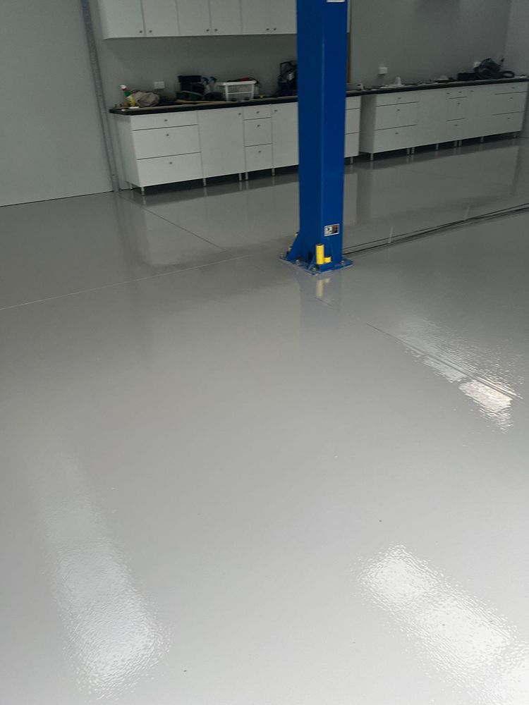 There is a blue pole in the middle of the room