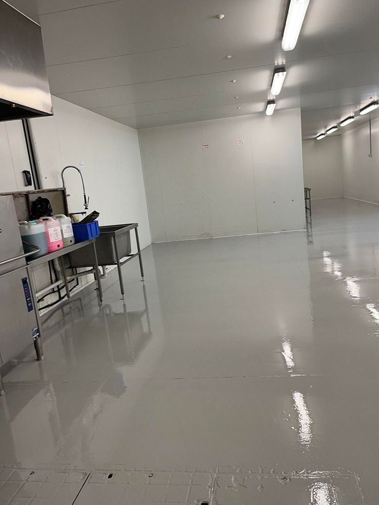 There is a sink in the middle of the room