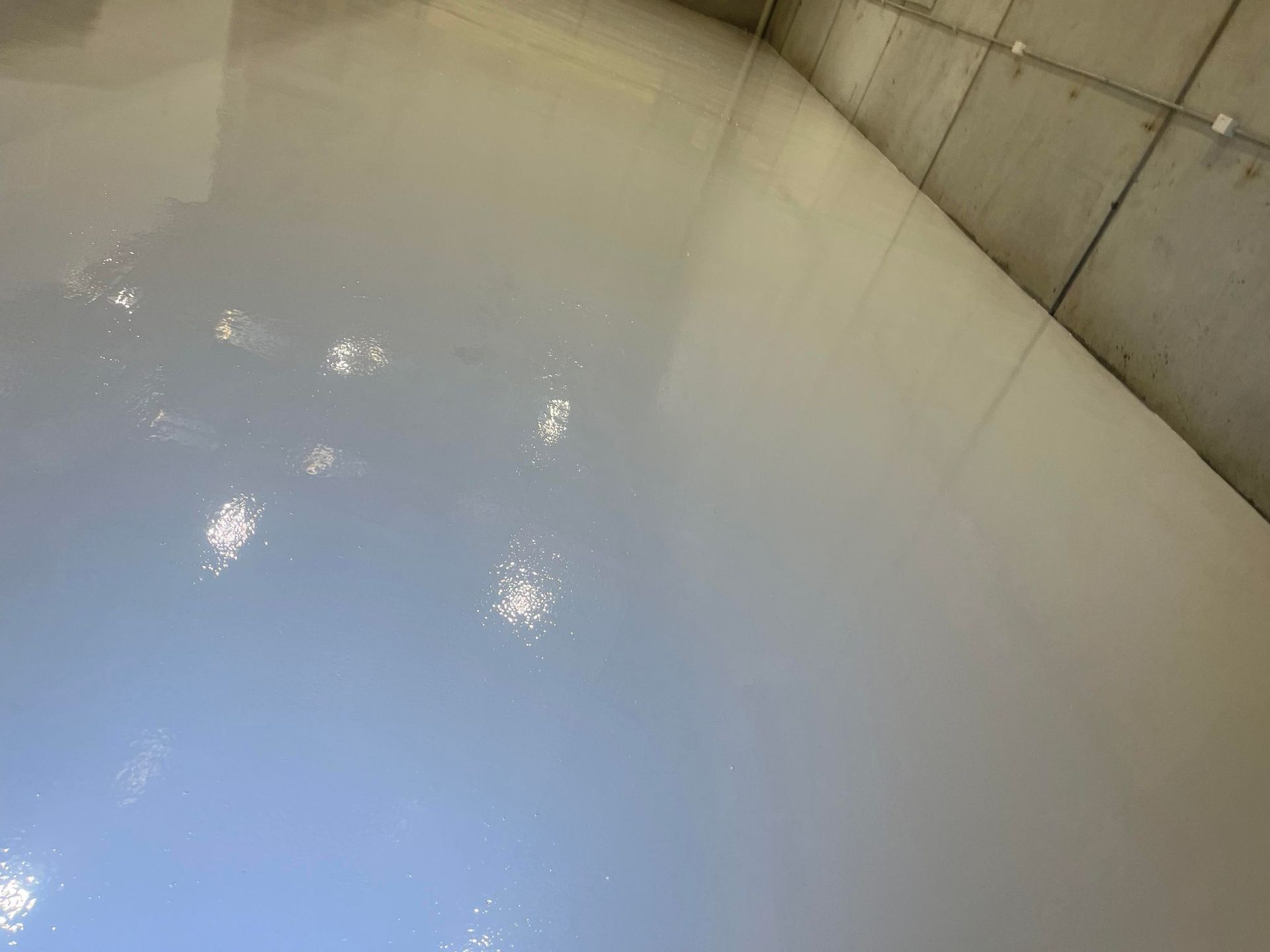 A white floor with a lot of lights on it